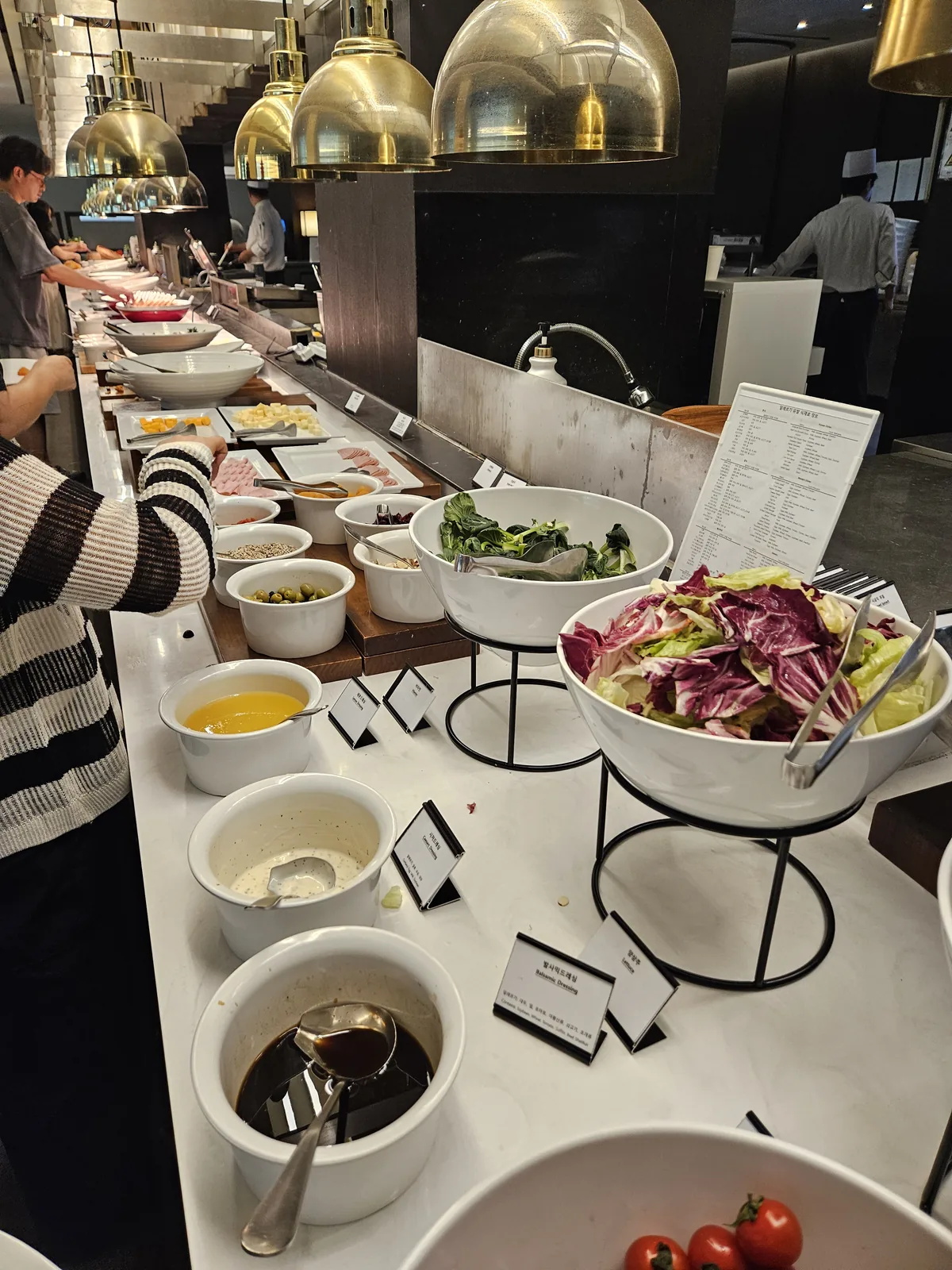 The salad bar, with house dressings