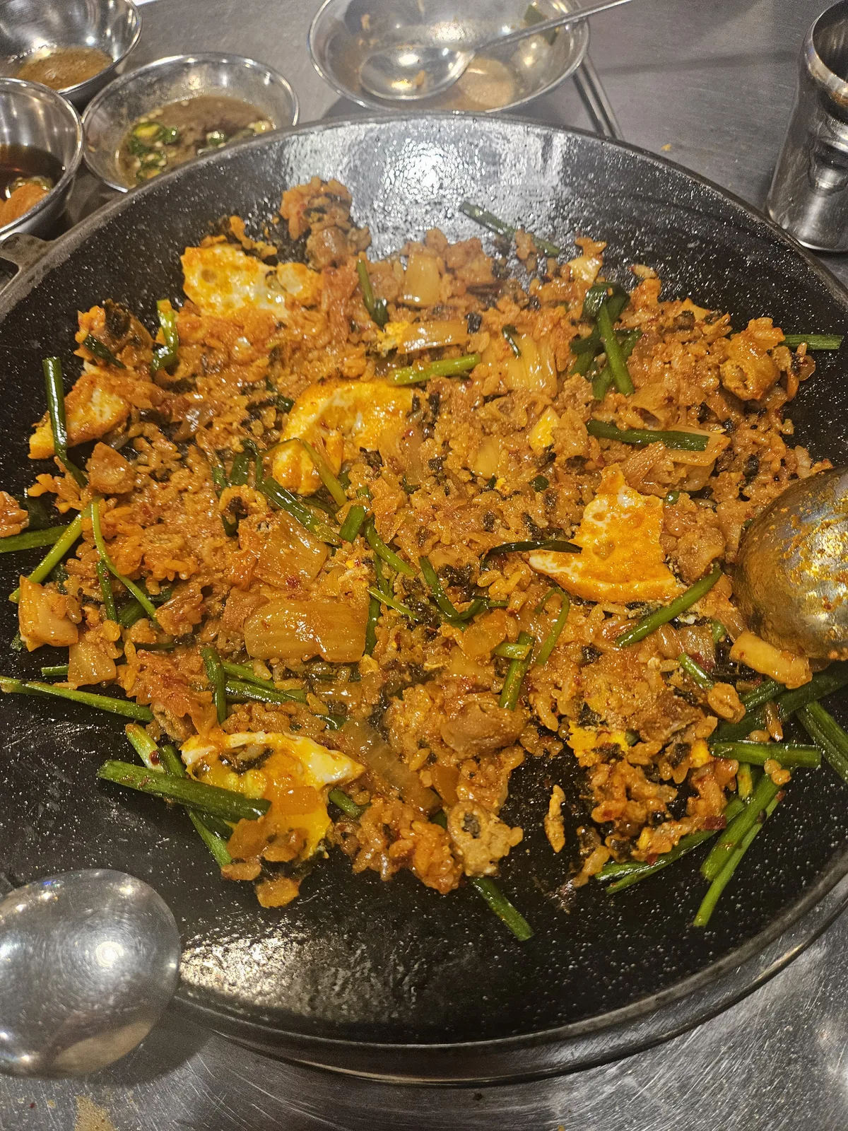 Finished — with a fried egg, seaweed flakes and chives on top